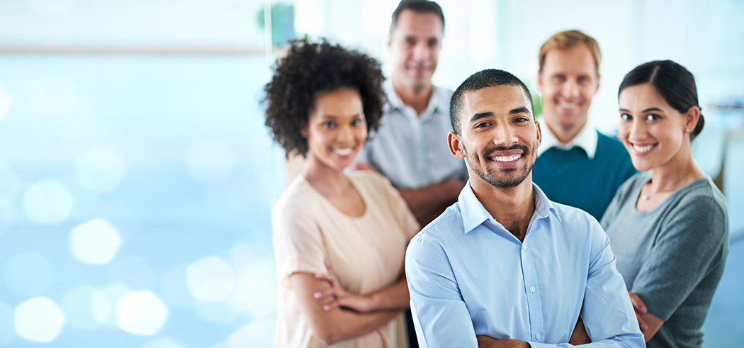 Portrait, happy and business people in office for solidarity, support or motivation with bokeh. Partnership, face and person team with diversity in solidarity for startup, management or collaboration.